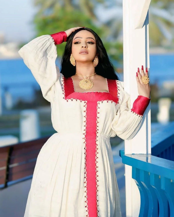 Elegant Habesha Kemis with Bold Red Embroidery for Celebrations: Traditional Ethiopian Dress