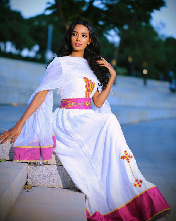 Simple Habesha Dress with Vibrant Pink and Gold Embroidery for Special Occasions